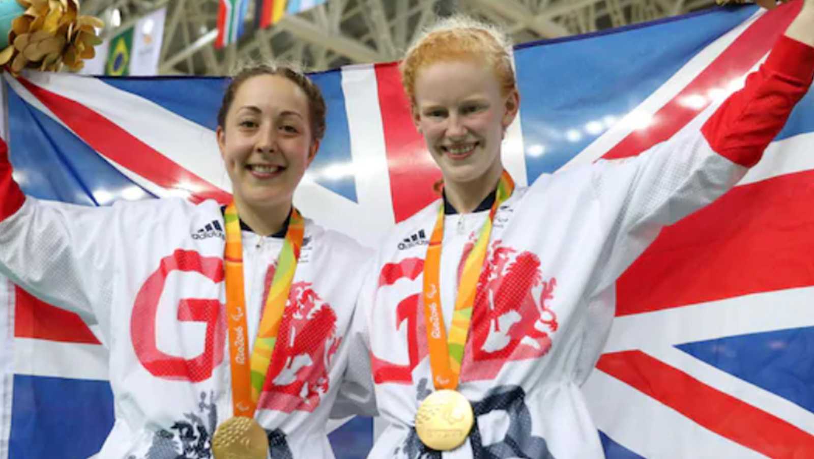 Picture of Sophie with Helen Scott wearing their gold medals holding a Union Jack flag Picture of Sophie with Helen Scott wearing their gold medals holding a Union Jack flag